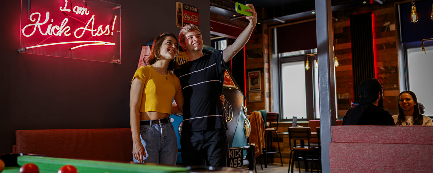 Kick Ass - Customers taking a selfie